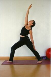 Rachael Rudich practicing Yoga - ajanafitness.com